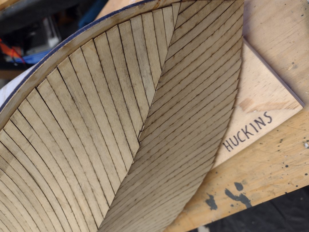 bottom fwd planking with the transition from overlapping to butt joining