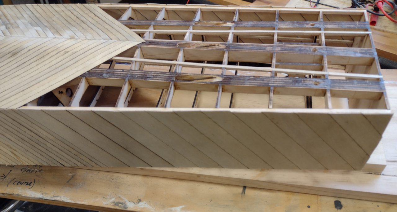 I started the planking at the bottom in the middle and planked forwards towards the bow, then planked the sides- John Drain's Model PT-Boat Site